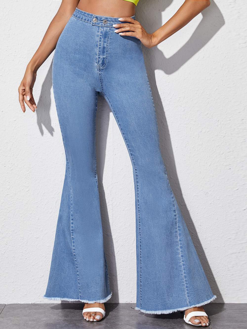 HIGH WAISTED RAW HEM FLARE LEG JEANS