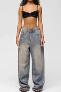 DISTRESSED RELAXED FIT JEANS