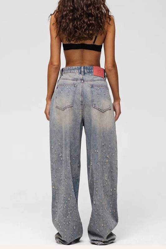 DISTRESSED RELAXED FIT JEANS